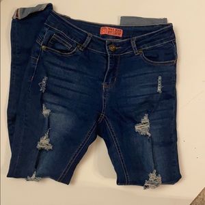 Distressed skinny jeans